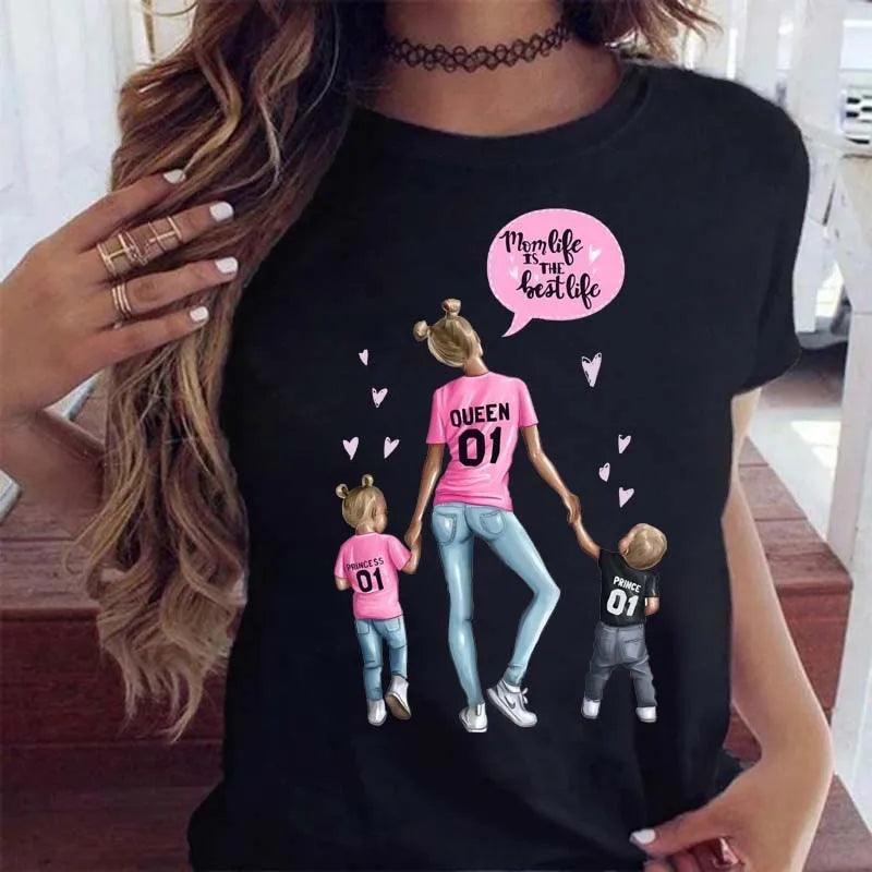 Black t-shirt featuring a graphic print of a mother holding hands with her daughter and son with pink heart accents.