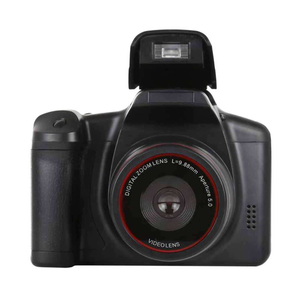 Black plastic digital camera with an open pop-up flash and lens labeled digital zoom and video lens.
