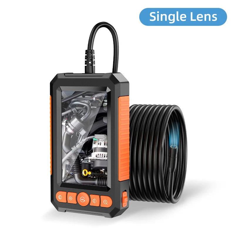Black and orange industrial inspection camera with a handheld monitor displaying an engine and a coiled cable.