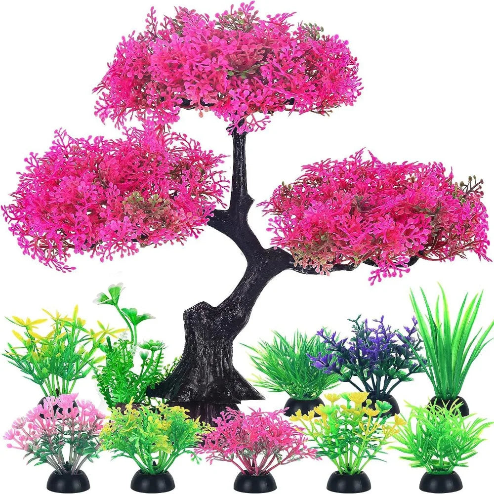 Artificial aquarium set featuring a large pink cherry blossom tree surrounded by ten smaller, colorful plastic plants.