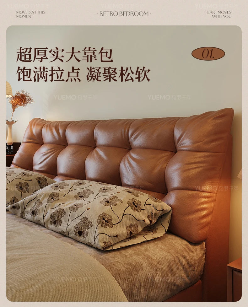 Modern Nordic double bed with a tan, tufted, overstuffed headboard and plush pillows.