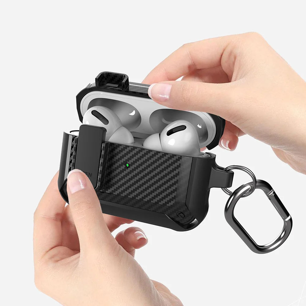 Black carbon fibre protective case with carabiner for Apple AirPods Pro, held open by hand.