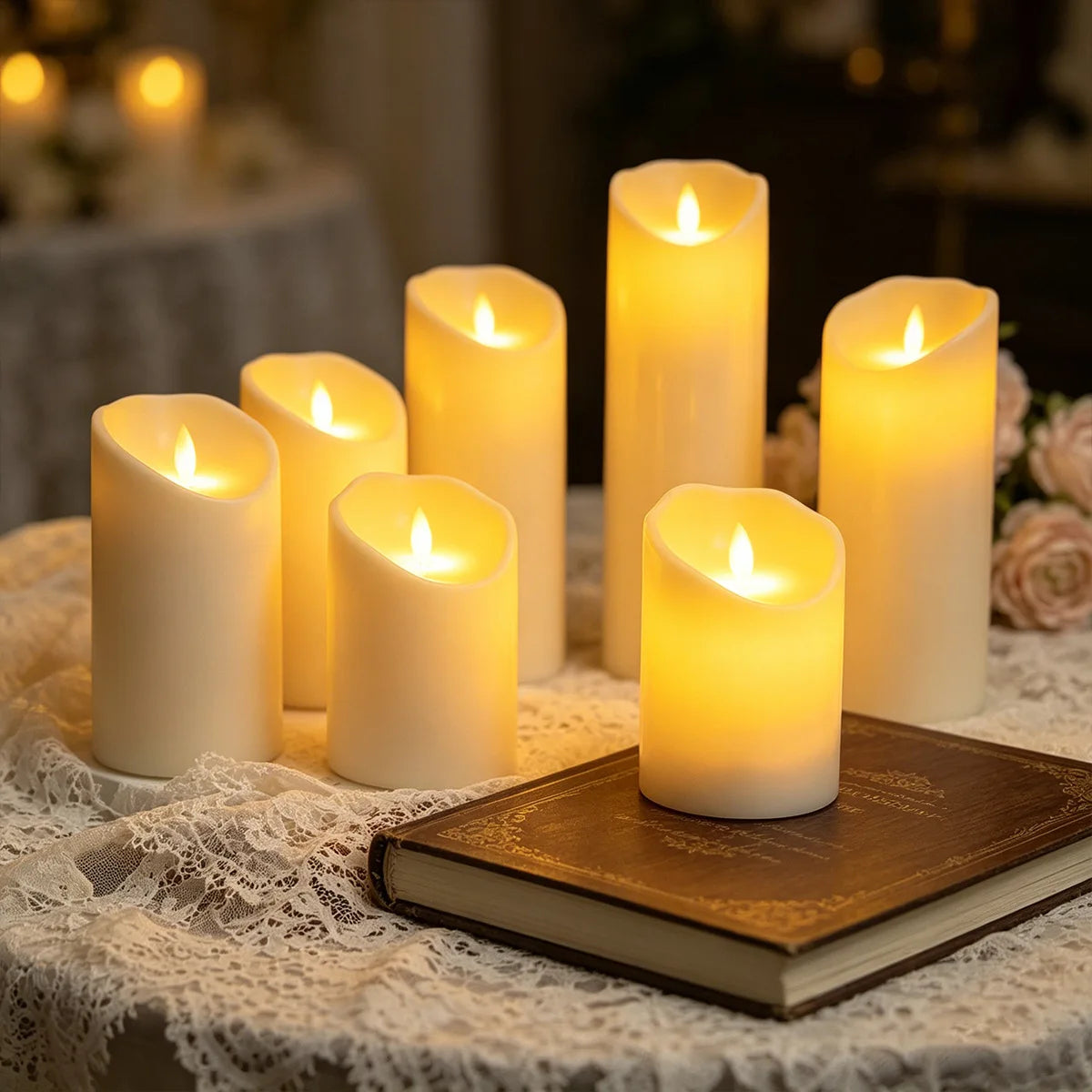 Set of ivory flameless LED pillar candles with melting-wax edges, glowing with warm yellow flame tips.
