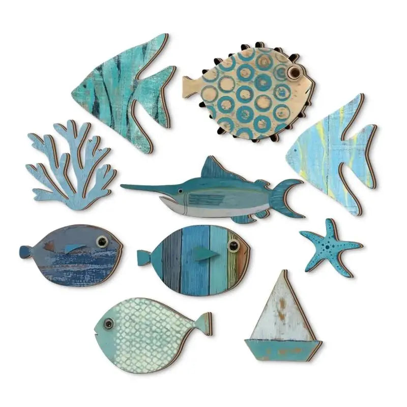 Set of 10 coastal-themed wooden wall decorations featuring fish, coral, a starfish, and a sailboat in blue tones.