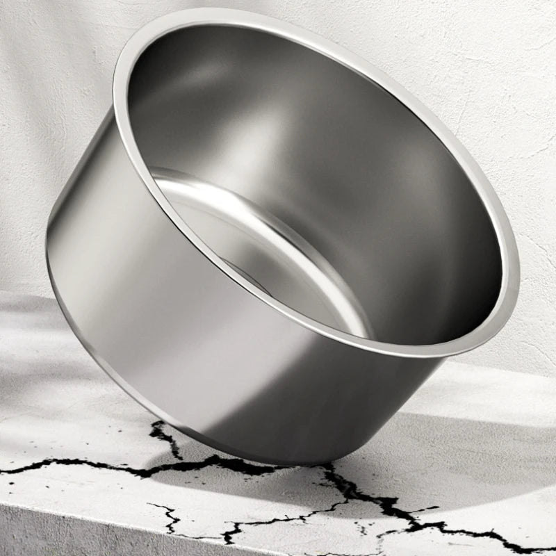 Large silver stainless steel elevated dog slow food bowl with thick walls.