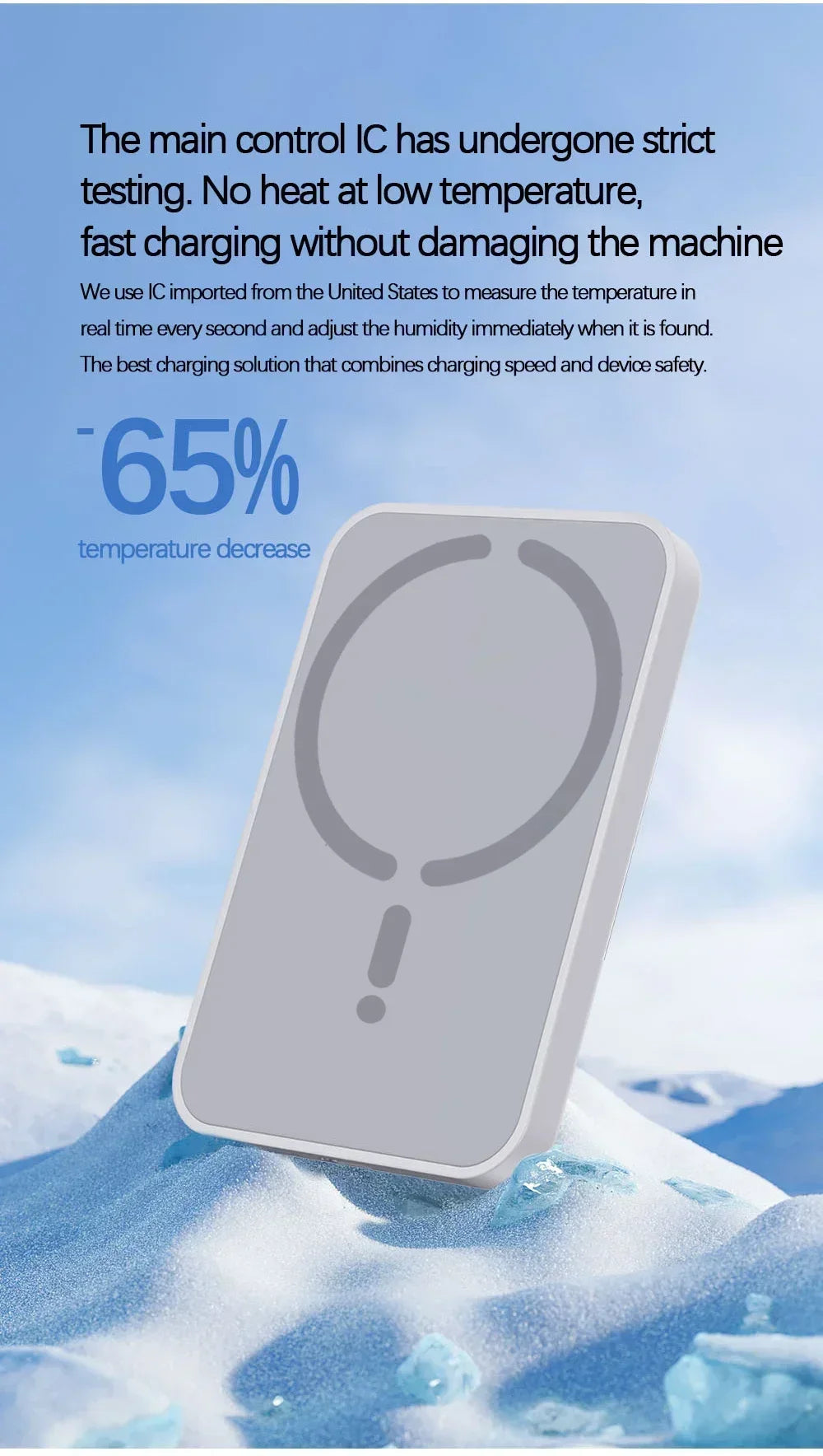 A sleek, rectangular grey magnetic wireless power bank with a circular logo on its surface, set against a snowy scene.