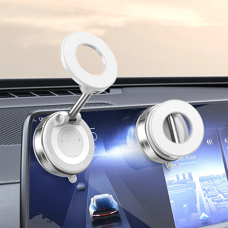 White circular car phone mount with a foldable arm, suction-cup style, attached to a car infotainment screen.