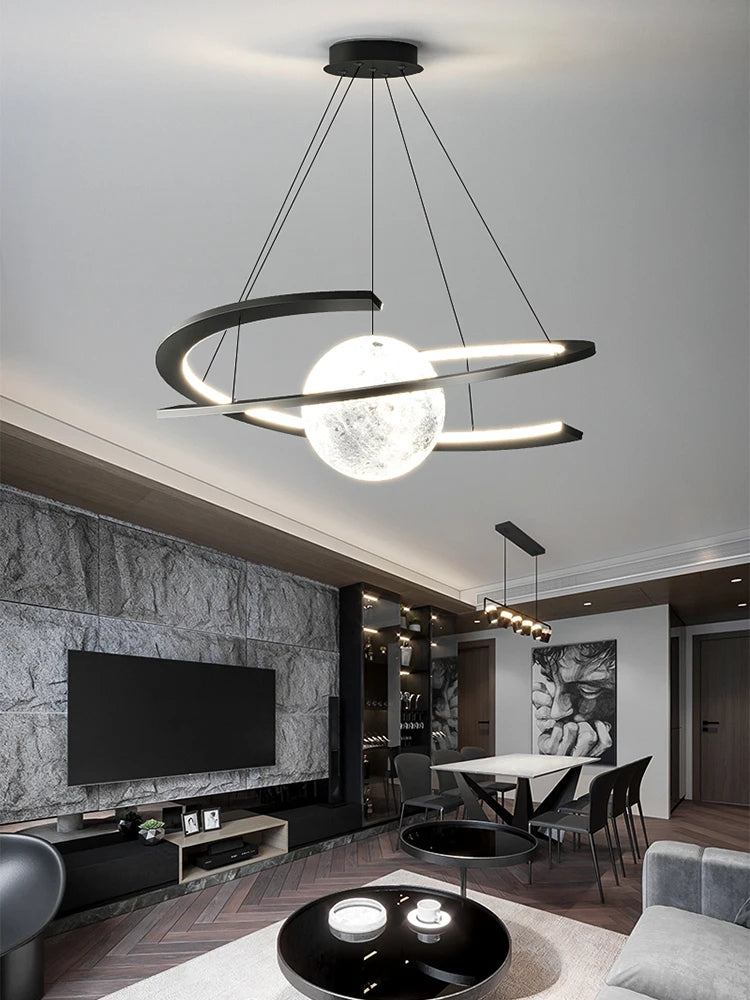 Modern black pendant ceiling lamp featuring an illuminated central globe encircled by curved LED rings.