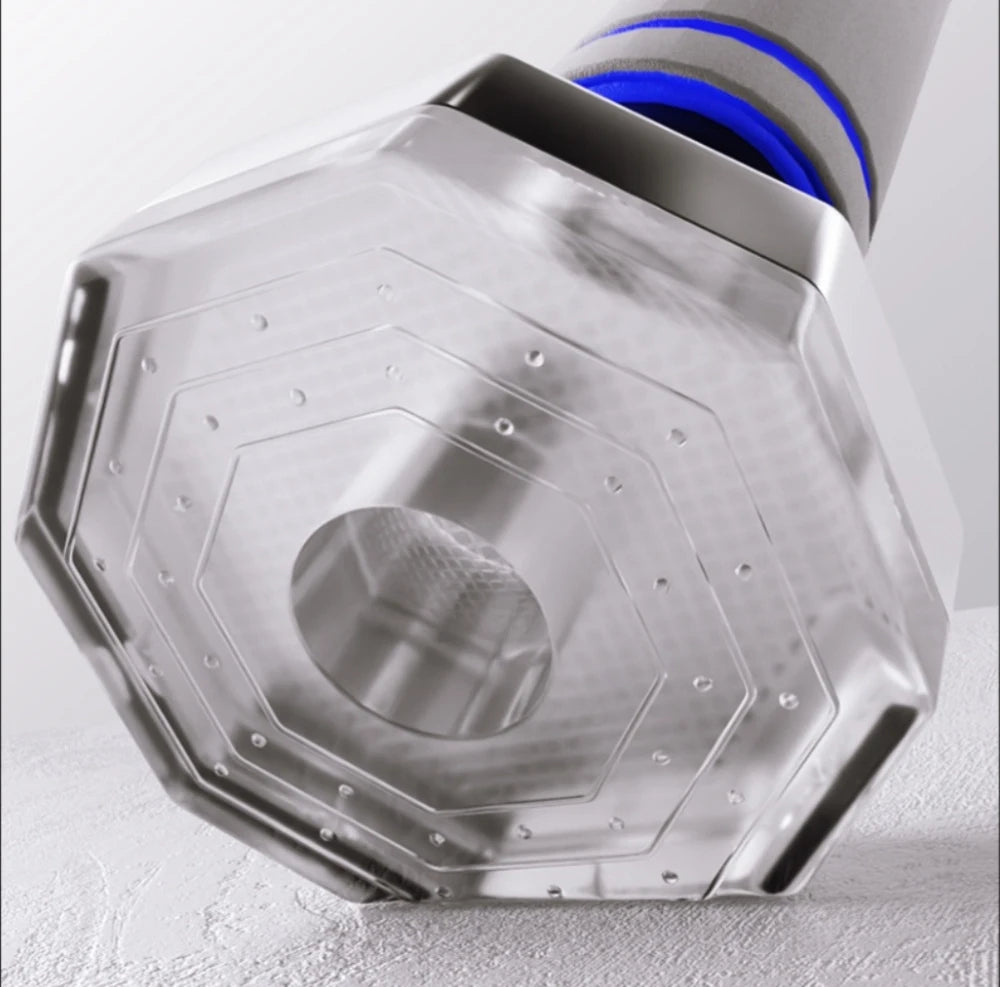 A close-up of a clear, octagonal-shaped hand weight with a grey and blue grip handle against a white background.