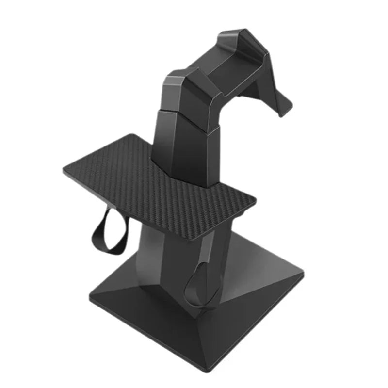 Black universal VR headset and controller display stand with a sleek, modern design and carbon-fibre textured shelf.