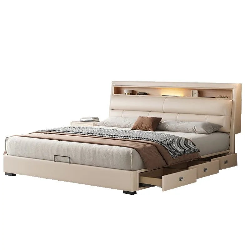 Cream leather upholstered bed with integrated headboard shelving, LED lighting, and side storage drawers.