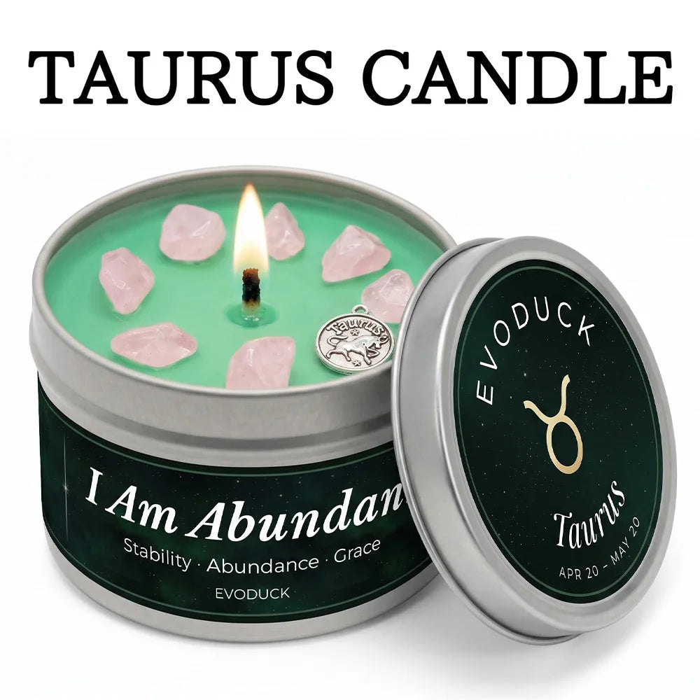 Green Taurus candle in a silver tin, topped with light pink crystals and a bull zodiac charm.