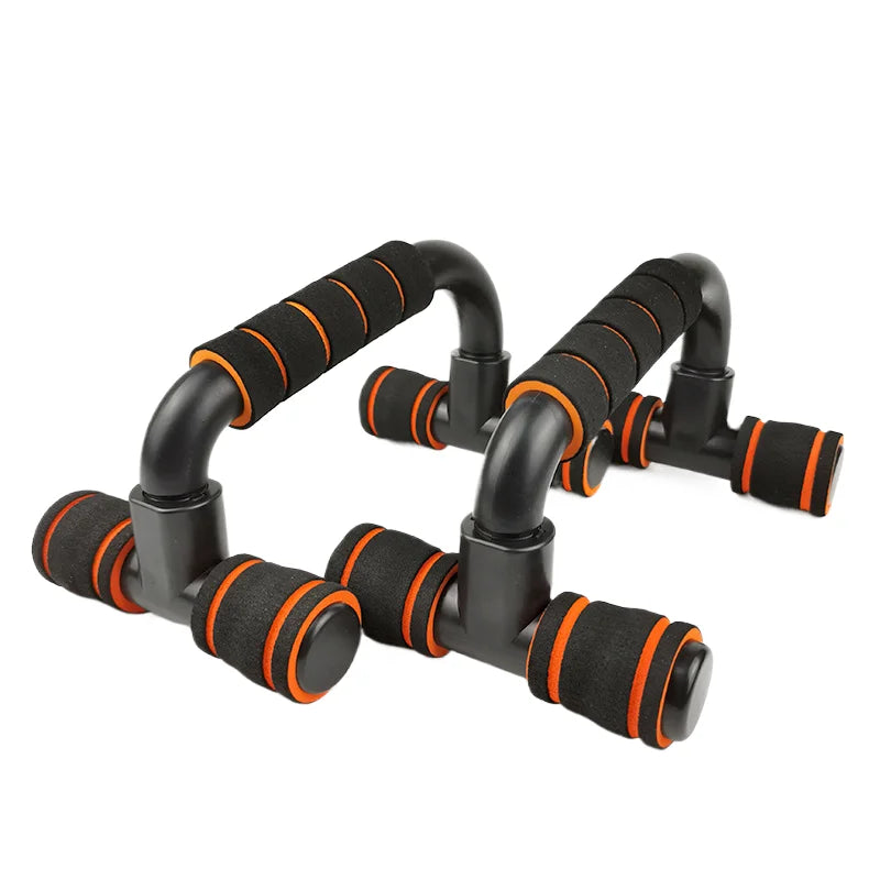 Pair of black push-up bars with orange foam-padded grips, set against a white background.