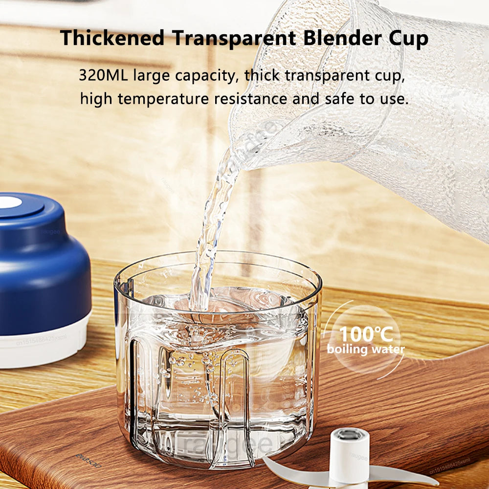 Clear, 320ml thickened blender cup being filled with boiling water, set on a wooden surface with a blue base nearby.