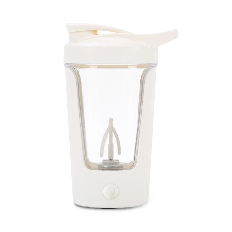 Off-white electric portable blender bottle with a clear body and integrated mixing whisk, isolated on white background.
