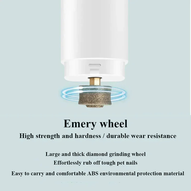 Close-up of a white electric pet nail grinder with a durable, rotating diamond-coated emery grinding wheel.