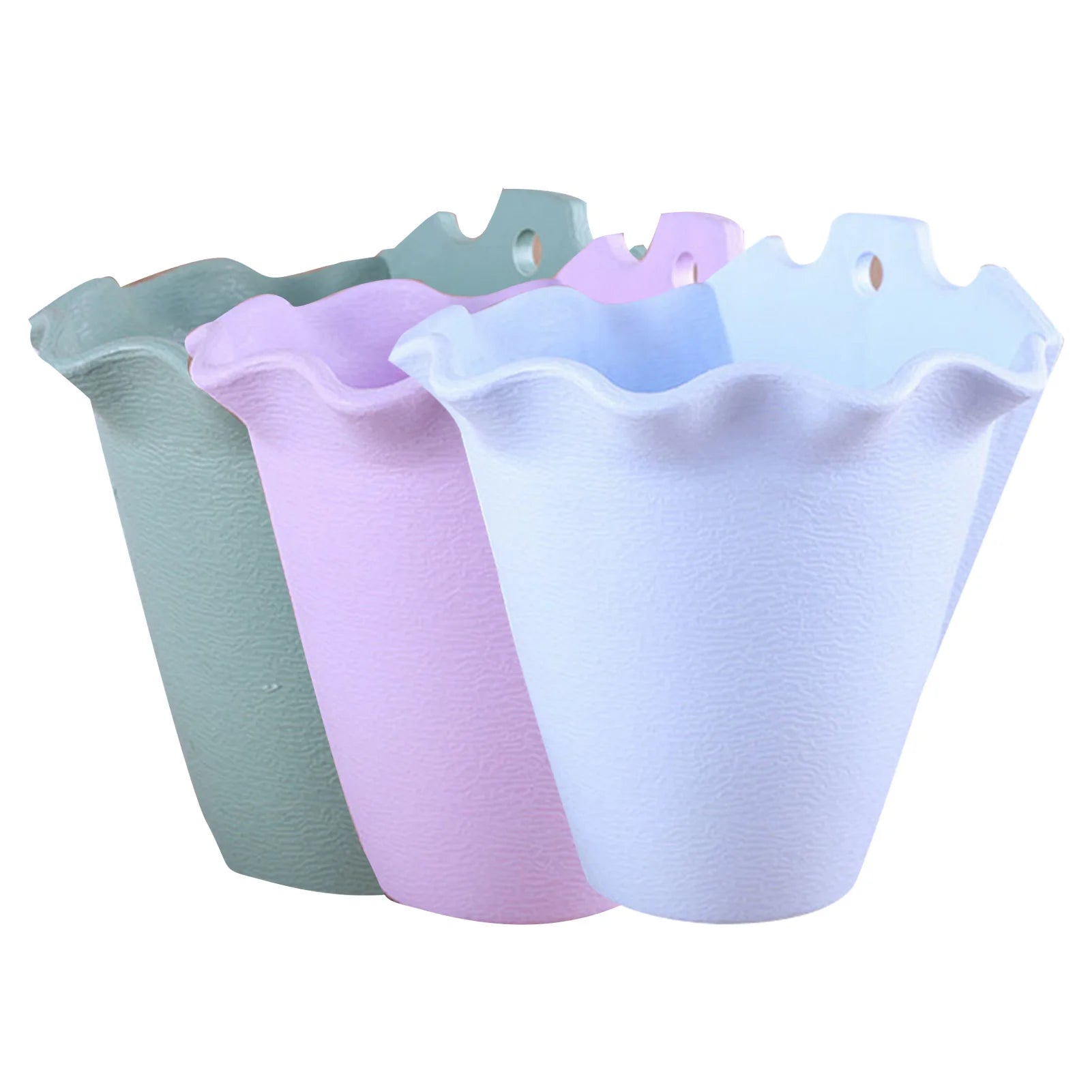 Three textured, wall-hanging plastic planters in sage green, soft pink, and light blue with scalloped edges.