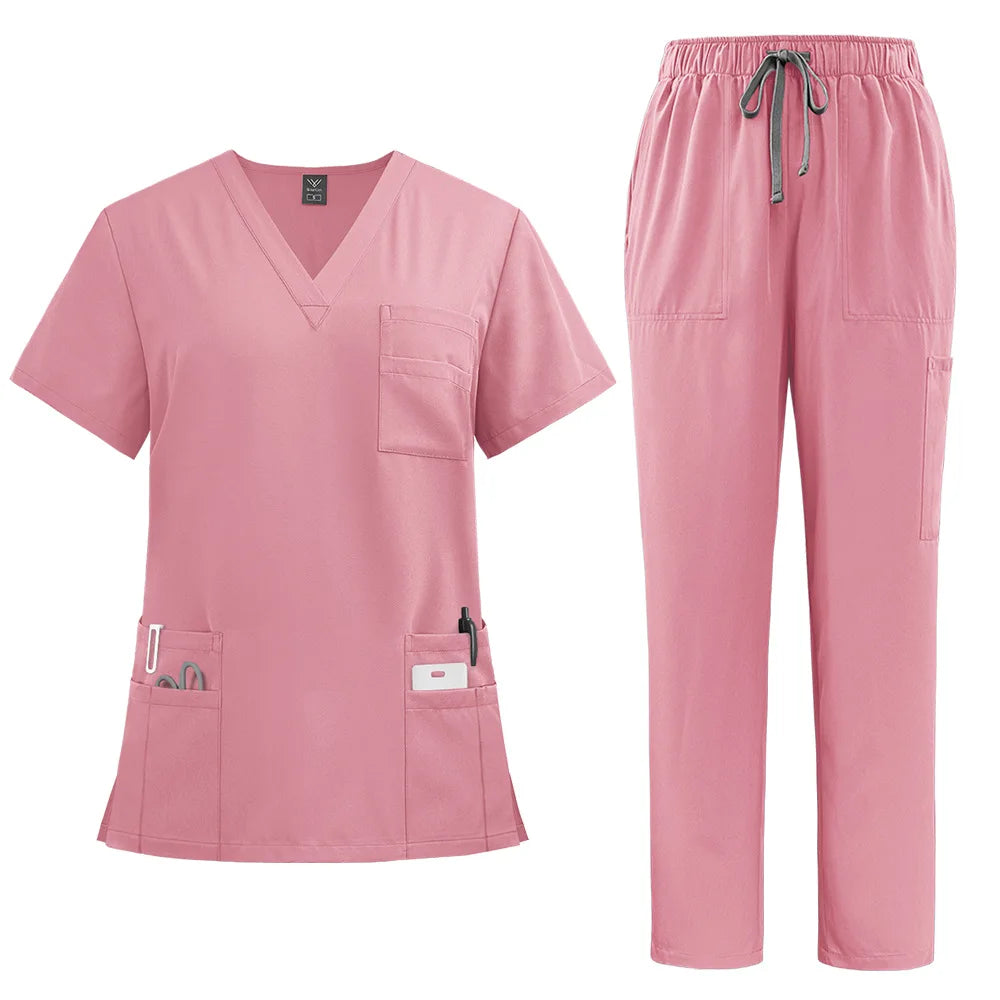 Dusty pink V-neck nurse scrub top with multiple pockets and matching trousers with an elasticated drawstring waistband.