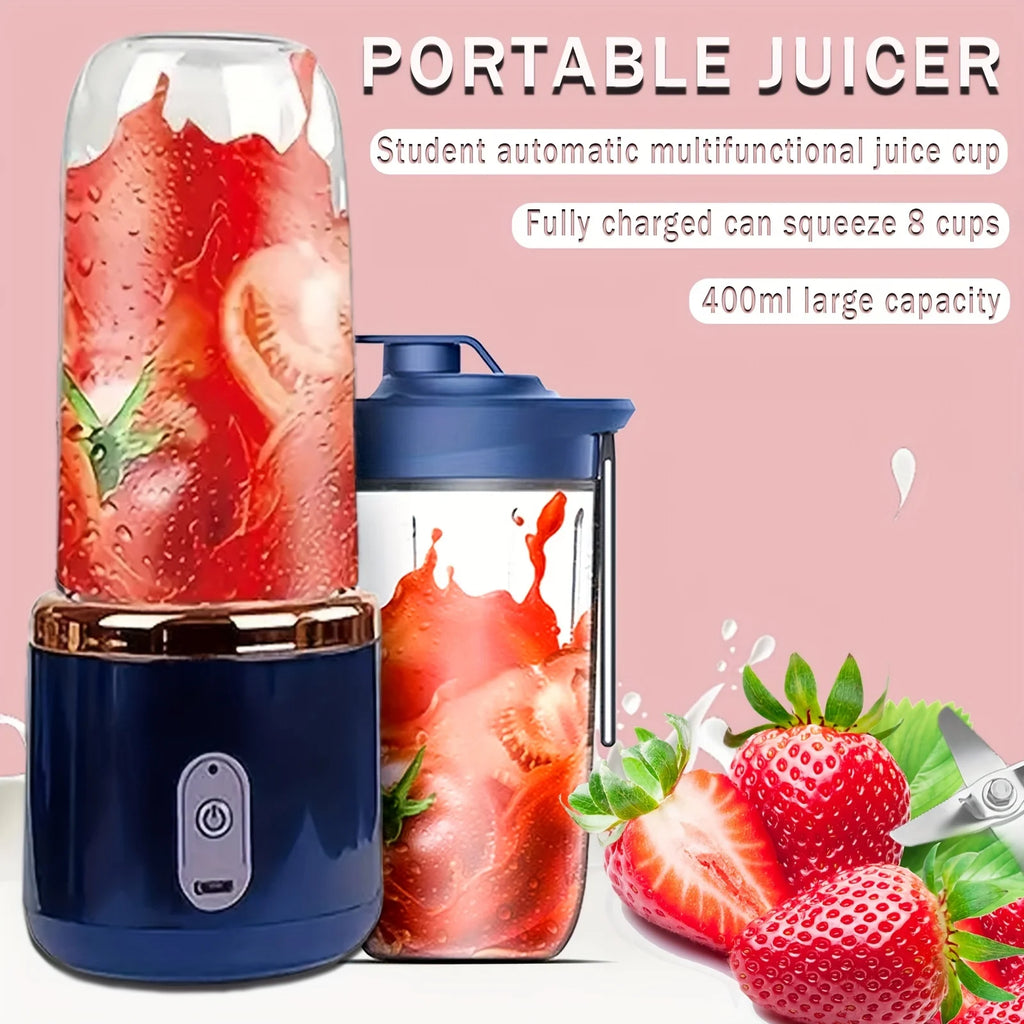 Portable electric juicer in dark blue with a 400ml clear cup, containing blended red fruit.