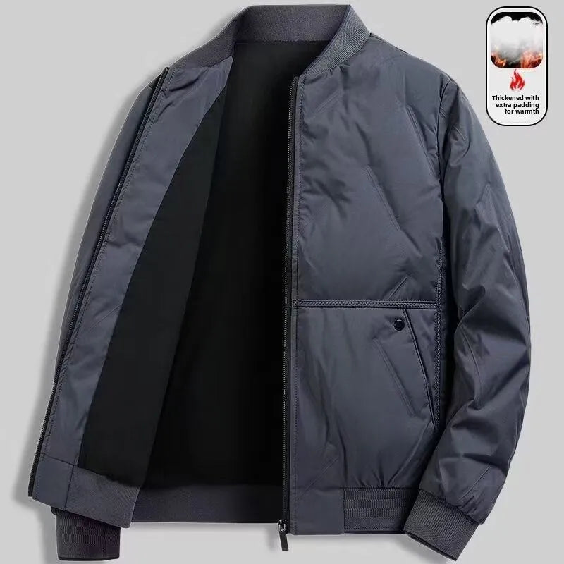 Men’s dark grey zip-up bomber jacket with ribbed collar, cuffs, and hem. Features warm, quilted padding and pockets.