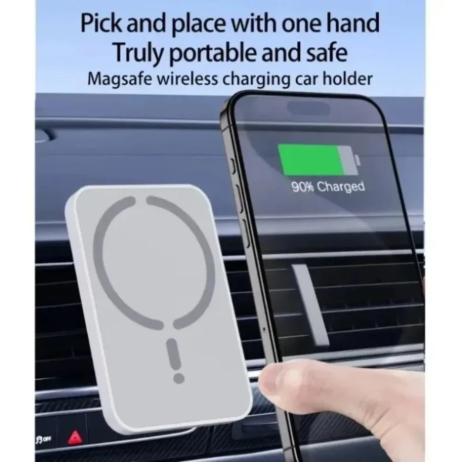 White rectangular magnetic wireless car charger mounted on a car air vent, charging a smartphone.