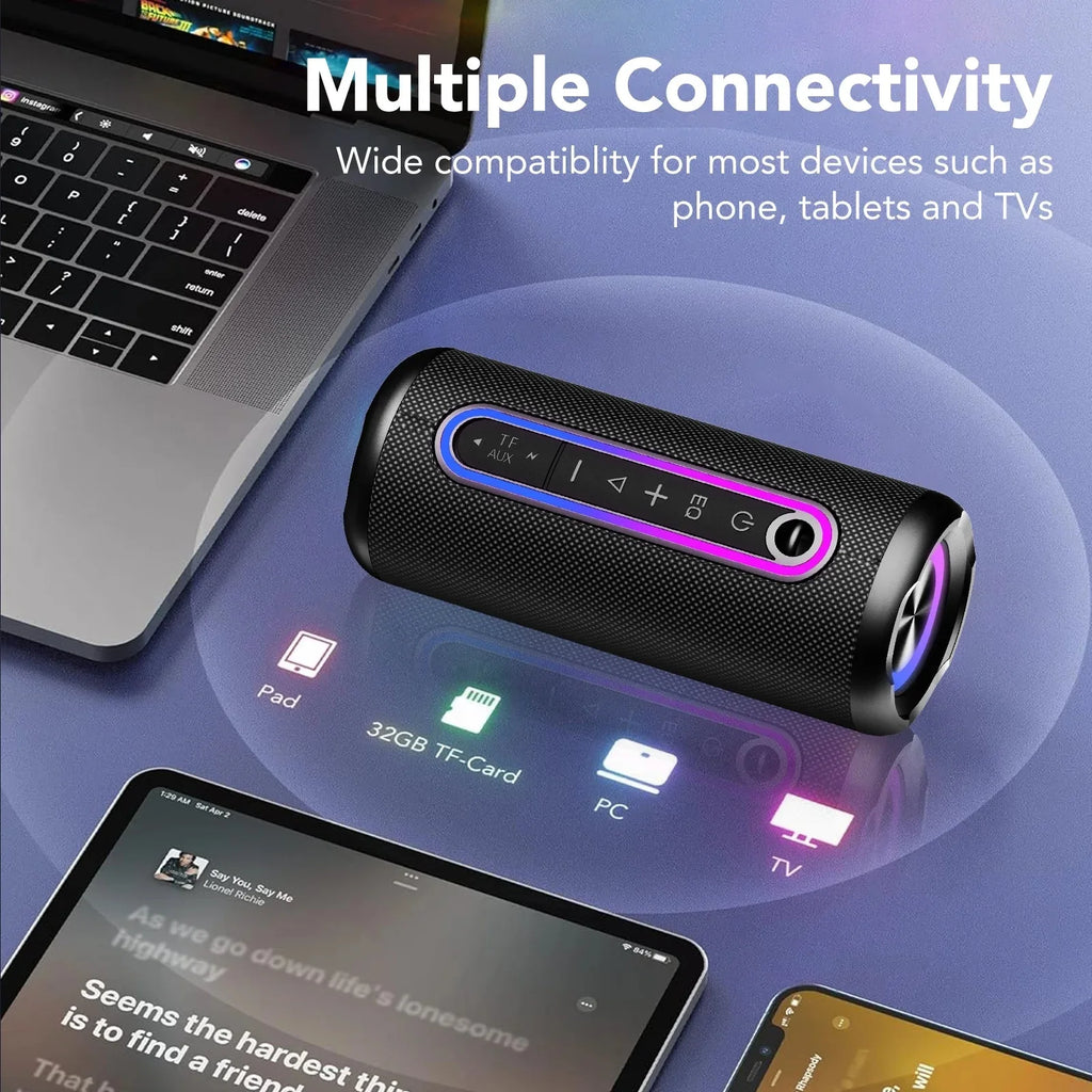 Black cylindrical Bluetooth speaker with purple LED strip, control buttons, and mesh texture, shown with devices.