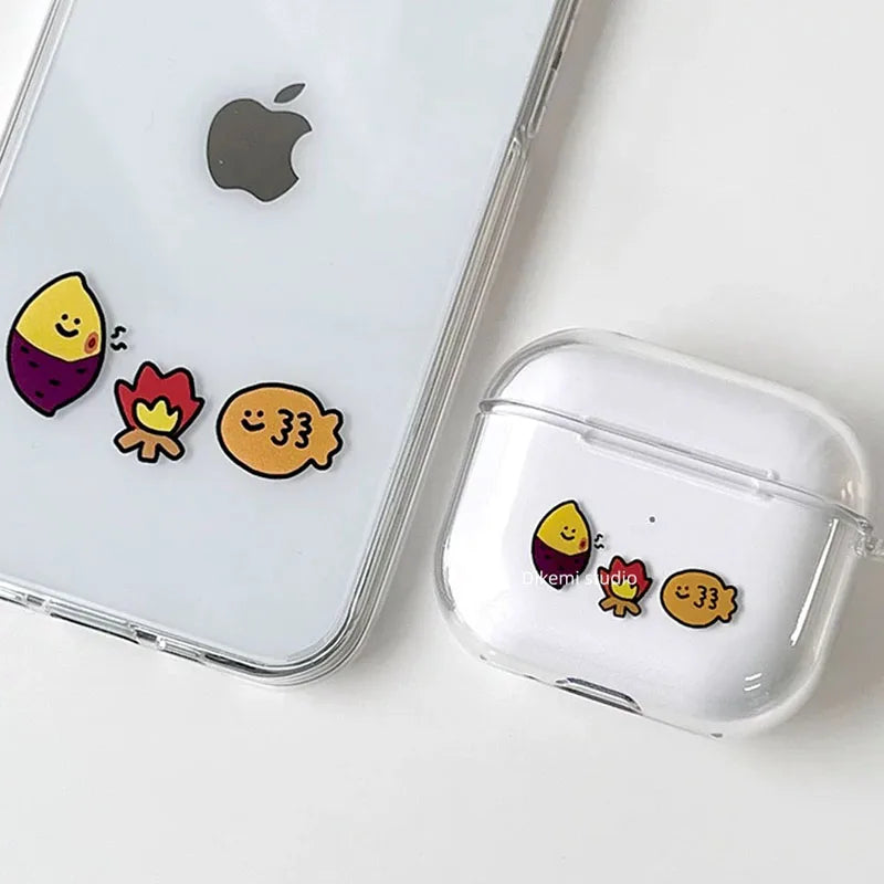 Clear silicone AirPods case with cute food-themed character stickers. Fits standard AirPods charging cases.