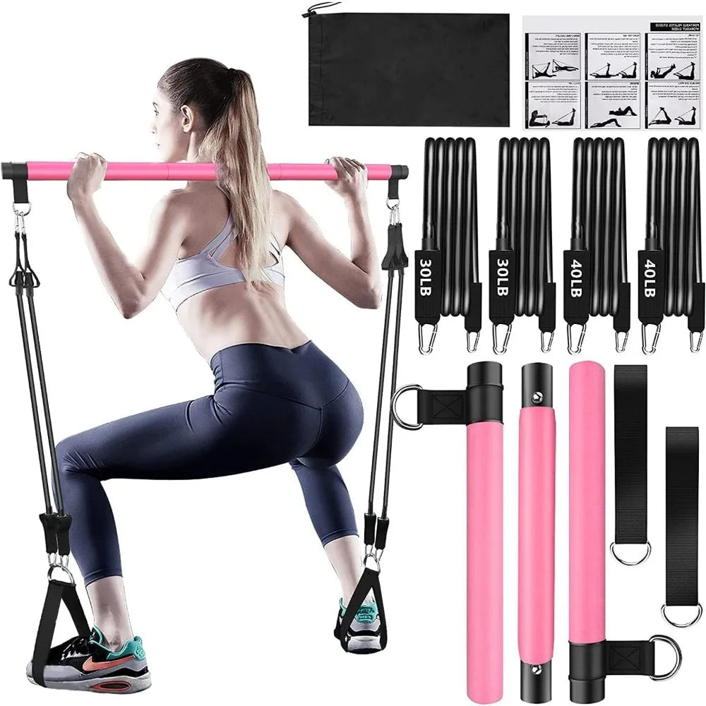 Pink resistance band set with fitness bar, black tubes, anchor straps, and carrying bag.