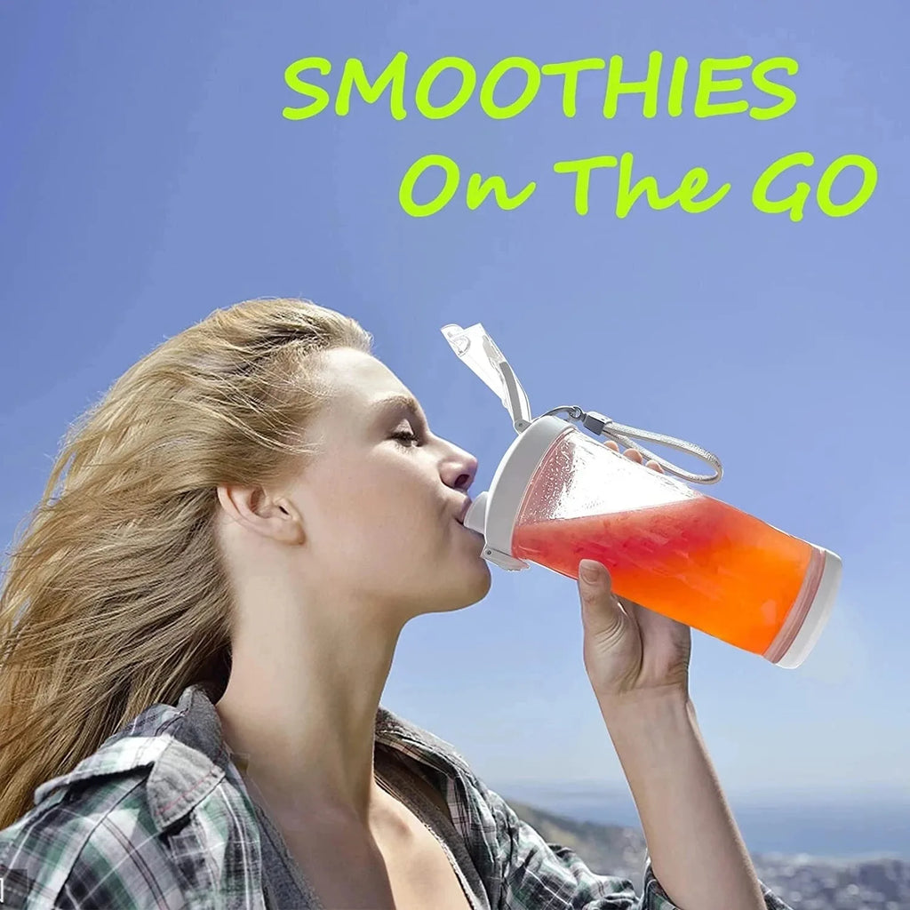 A woman drinking a bright orange smoothie from a clear, portable plastic bottle with a white flip-top lid.