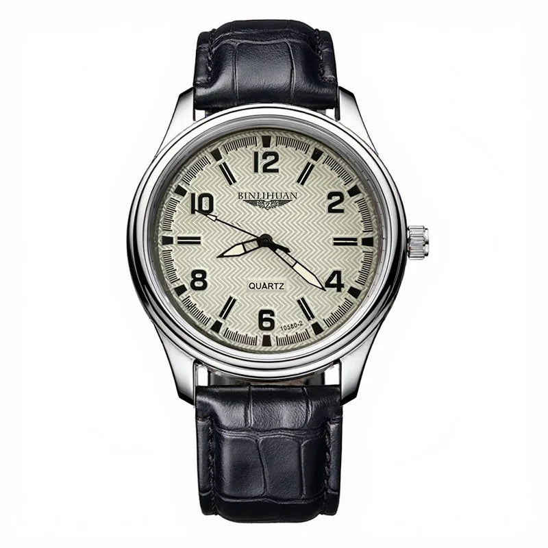 Men’s classic quartz watch with a textured cream dial, silver-tone case, and a black embossed leather strap.