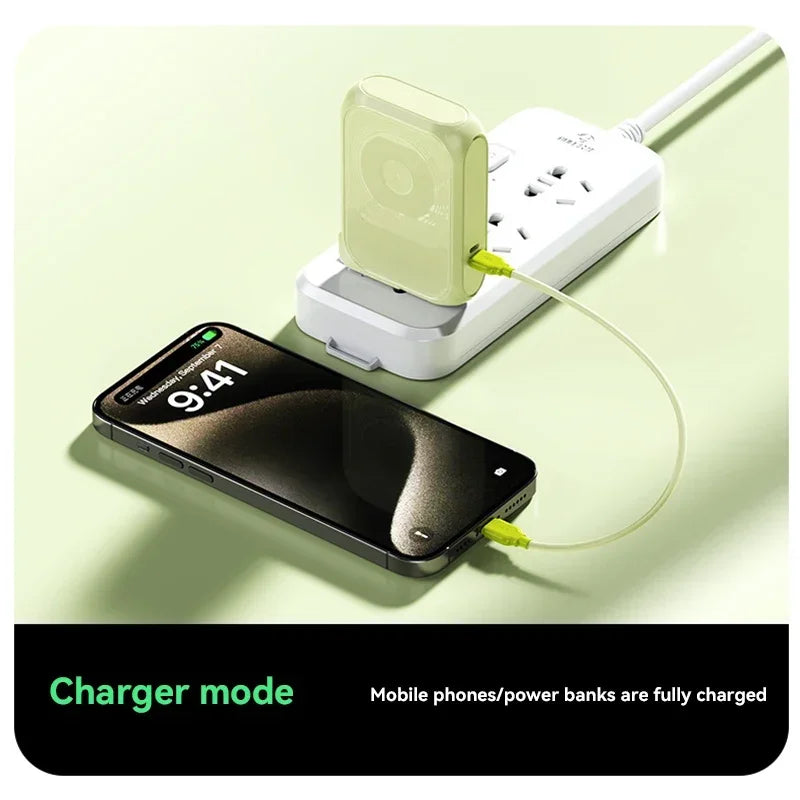 Sage green 10000mAh magnetic power bank and smartphone charging simultaneously from a wall plug.
