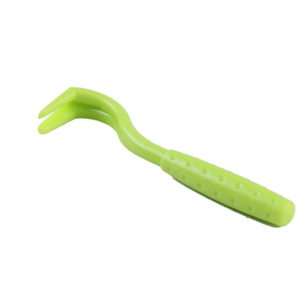 A lime green plastic hoof pick with a textured, non-slip handle, set against a plain white background.