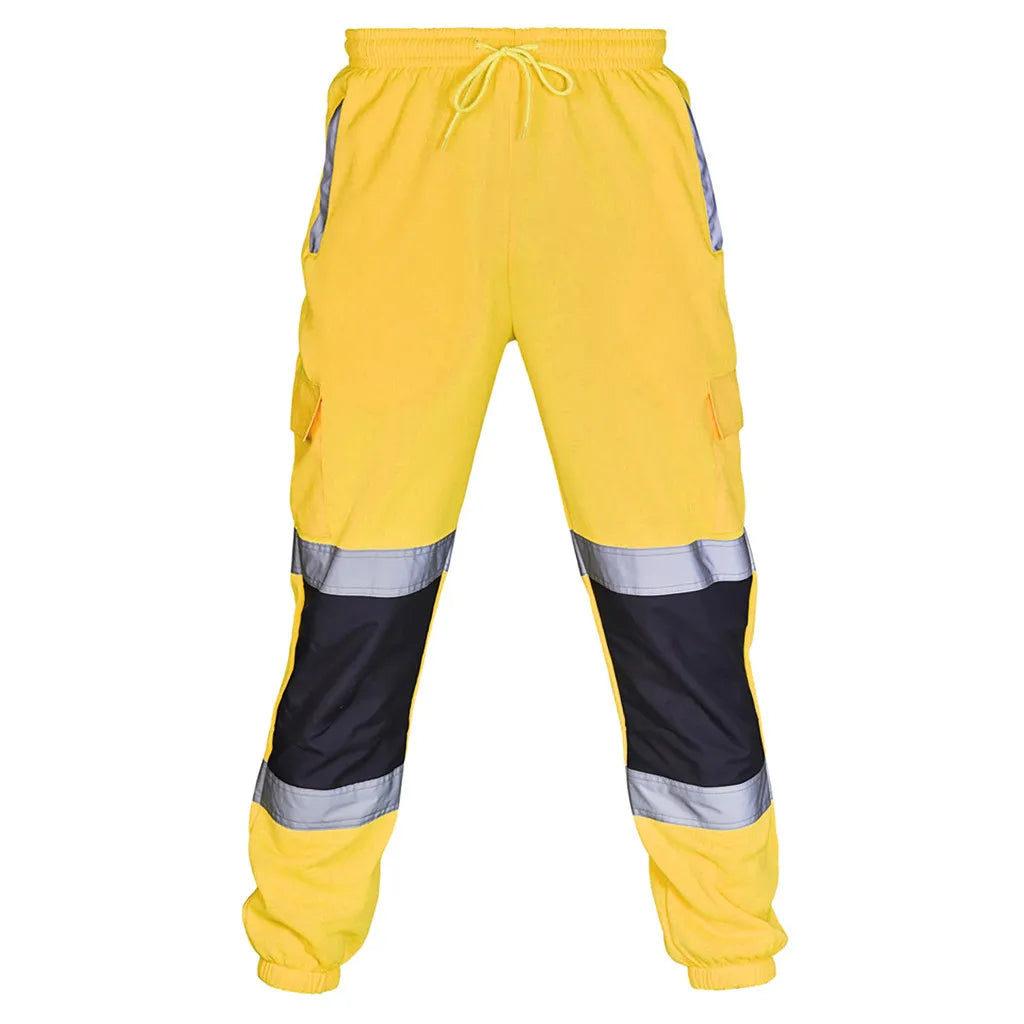 Men’s high-vis yellow work trousers with black knee panels, reflective stripes, side cargo pockets and drawstring waist.