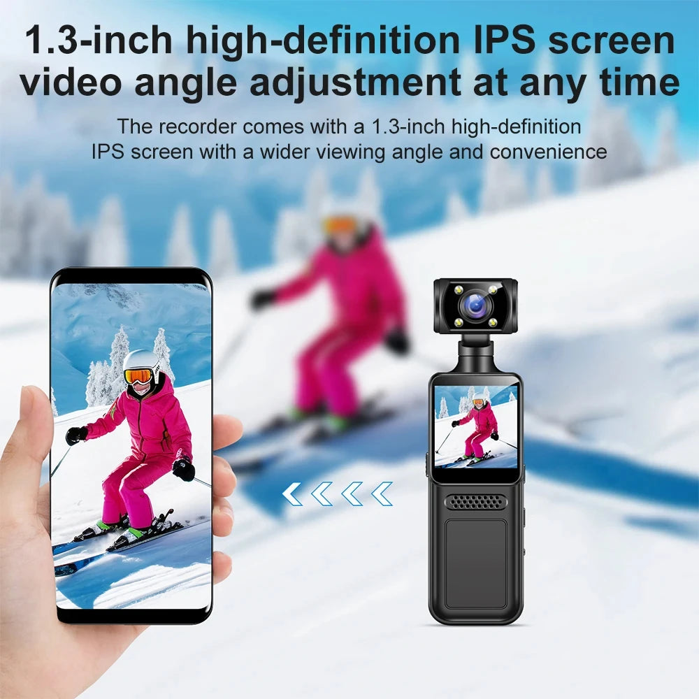 Black handheld video recorder with a 1.3-inch IPS screen and an adjustable camera lens.