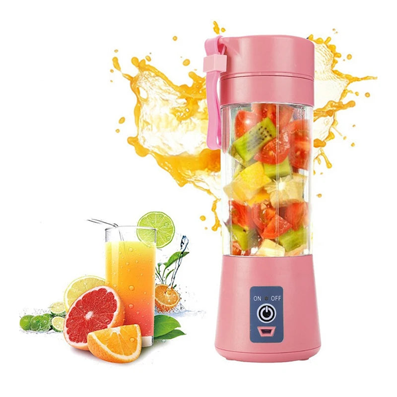 A portable, pink handheld blender filled with chopped fruit, next to a glass of fresh juice and citrus slices.