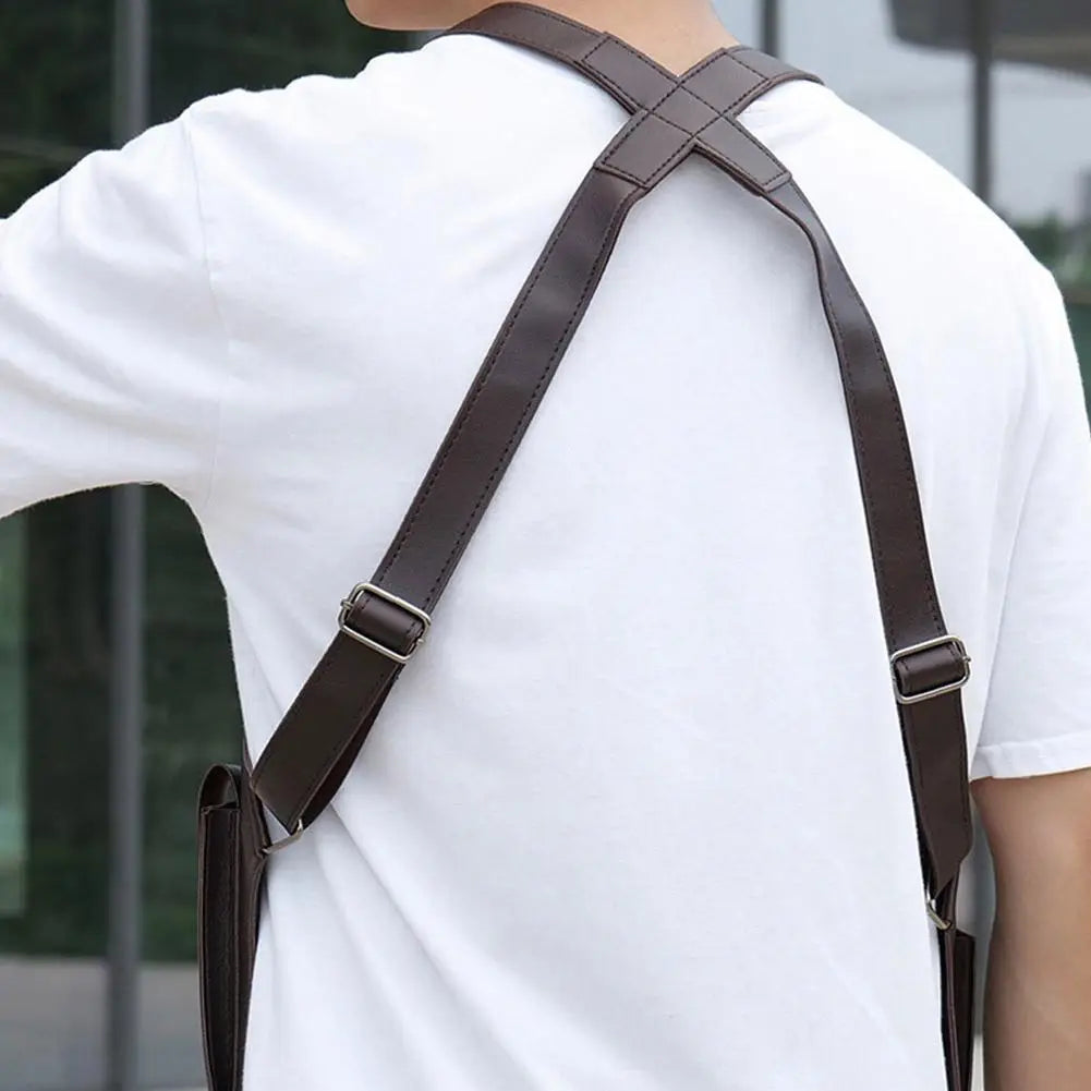 A man wearing a brown leather-look tactical crossbody holster bag with adjustable straps over a plain white t-shirt.