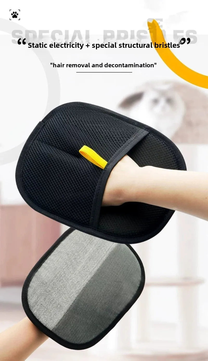 A black and grey double-sided pet hair removal mitt with a yellow elastic hand strap.