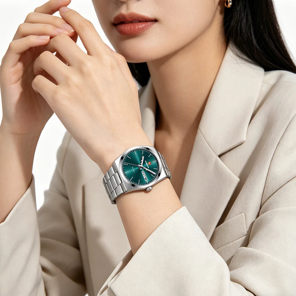 Ultra-thin women's quartz watch with a sleek silver stainless steel strap and a striking emerald green dial.