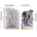 White silicone mould and a finished purple-tinted candle featuring an angel and lion design with dimensions.