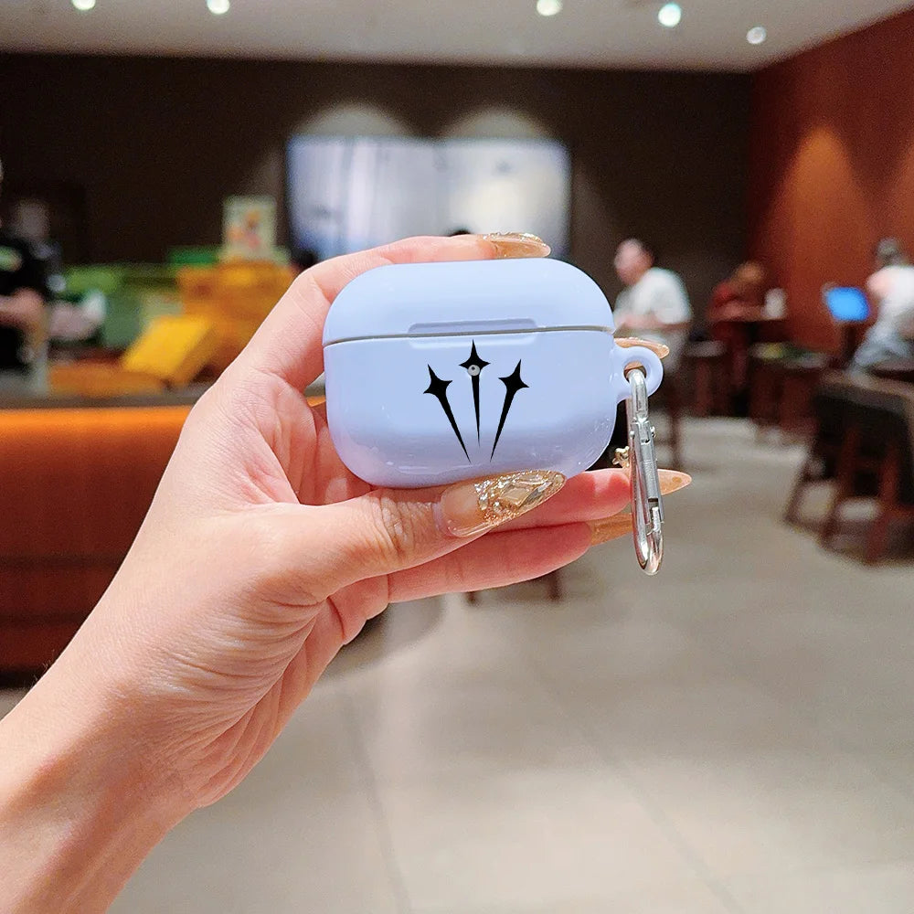 Light blue silicone AirPods Pro case with star motif and metal carabiner held in hand.