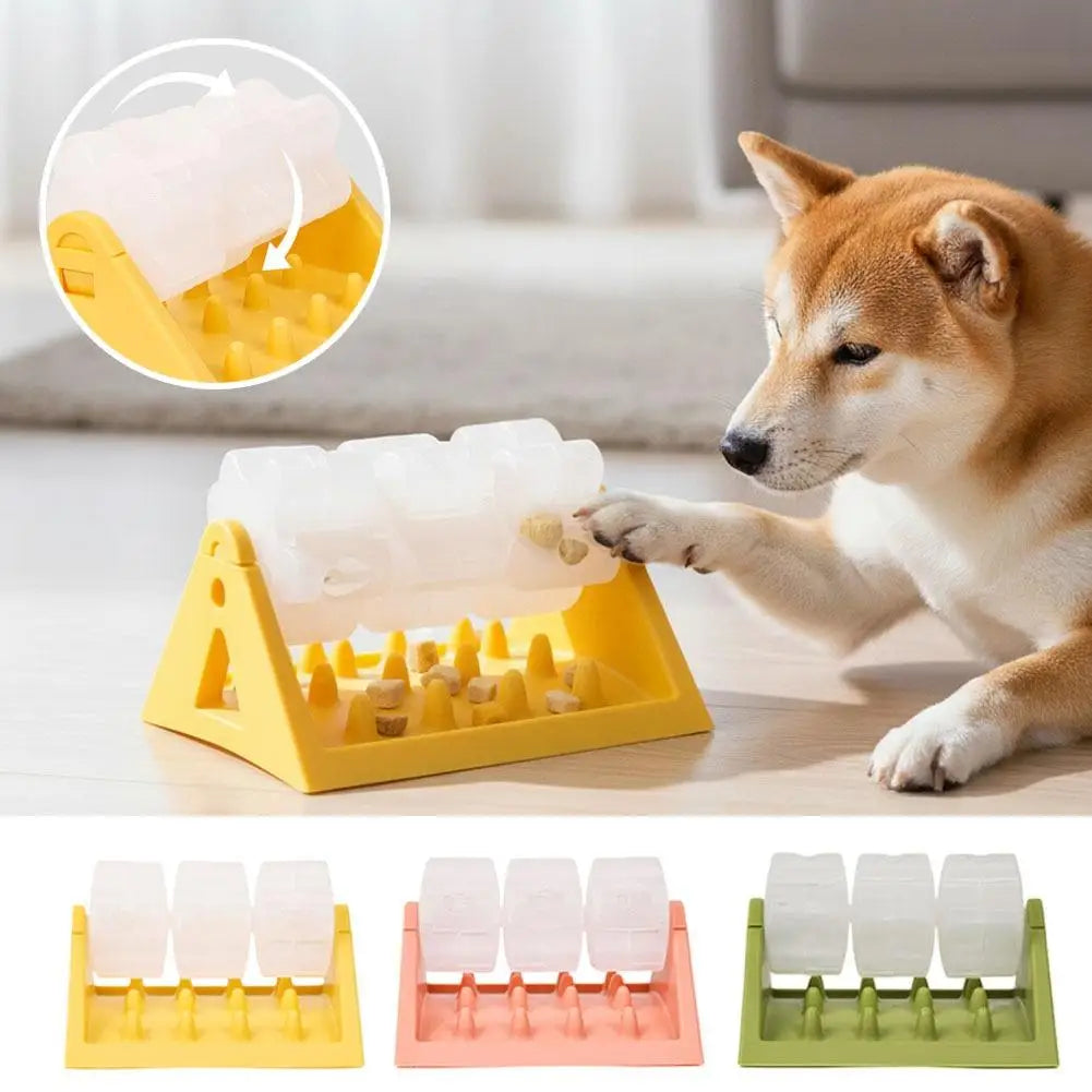 A dog using an interactive yellow puzzle feeder with a rotating clear dispenser. Available in yellow, pink and green.