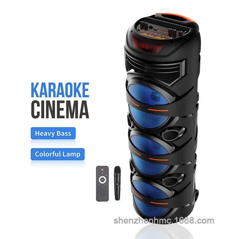 Portable black wireless Bluetooth party speaker with blue light-up speakers, including a microphone and remote control.