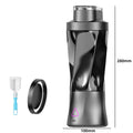 Portable black electric blender bottle with a twist design, power button, and cleaning brush, 280mm tall.