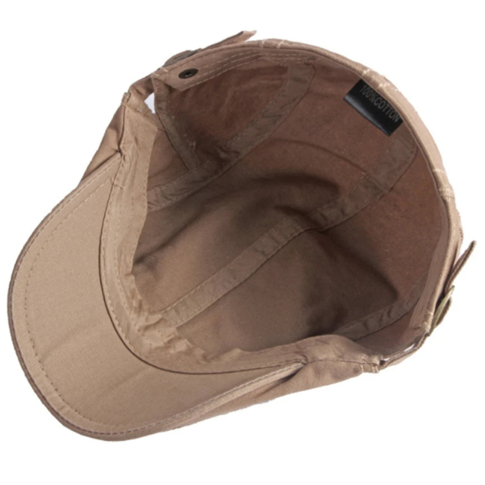 Interior view of a light brown, unisex cotton flat cap with a structured peak and side adjusters.