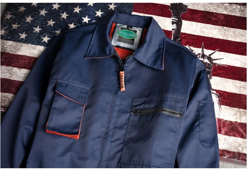 Dark blue work jacket with orange trim, front zipper closure, and multiple chest pockets.