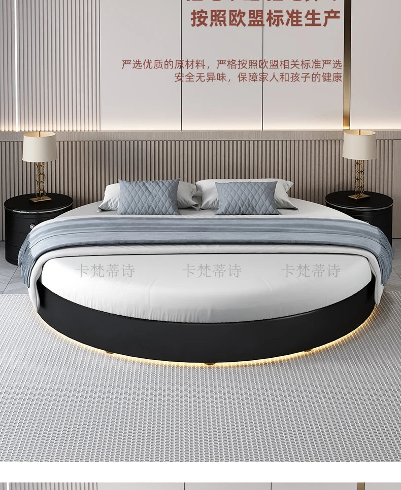 Modern, minimalist black round bed frame with under-bed LED lighting, featured in a contemporary bedroom setting.