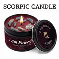 Scorpio zodiac candle in black tin, featuring red wax, crystals, and a silver scorpion charm.
