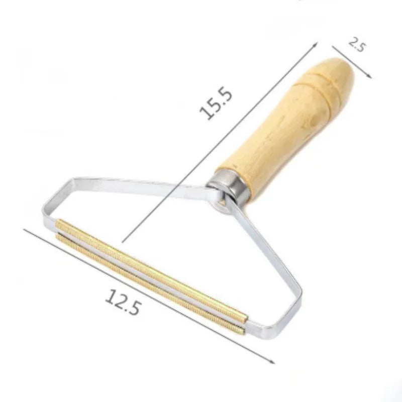 Fabric lint remover with a wooden handle and copper scraping head, shown with dimensional measurements.