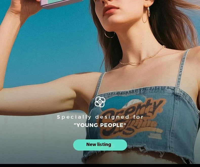 Blue denim cropped camisole with thin straps and a graphic print on the front.