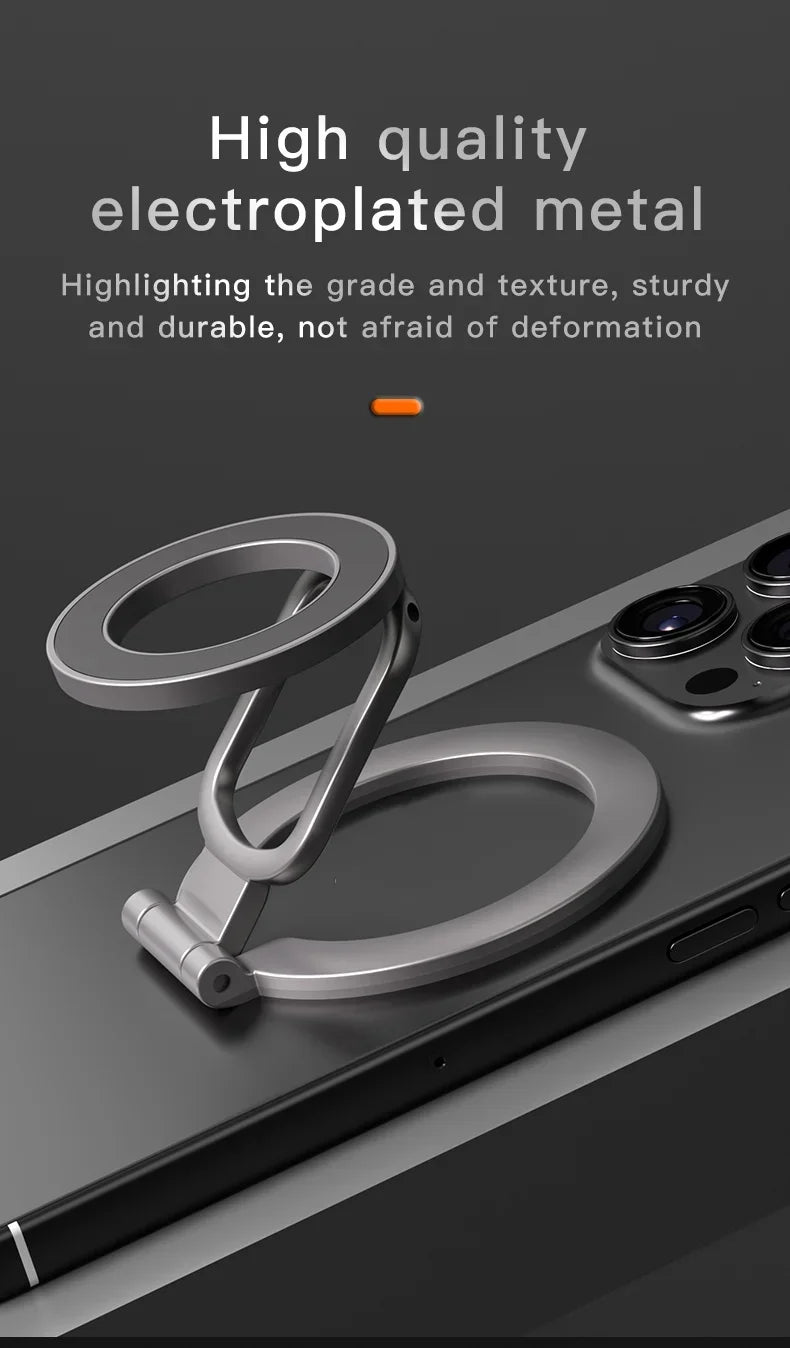 Silver, electroplated metal magnetic ring holder stand attached to the back of a black smartphone.